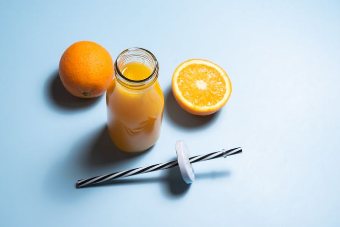Juice bottle product shot on a clean surface